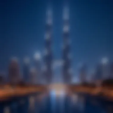 The twin towers illuminated at night, enhancing Dubai's skyline.