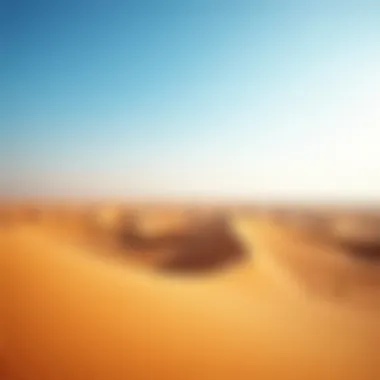 Stunning Desert Landscape Near Dubai A breathtaking view of the desert landscape surrounding Dubai, showcasing golden sand dunes under a clear blue sky